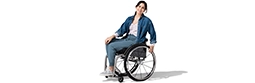 A woman in a wheelchair.