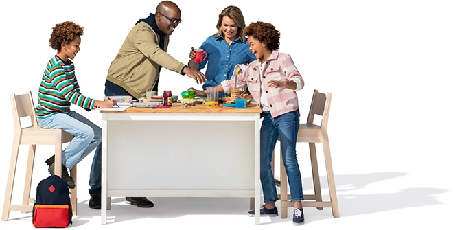 A family of four enjoys breakfast.