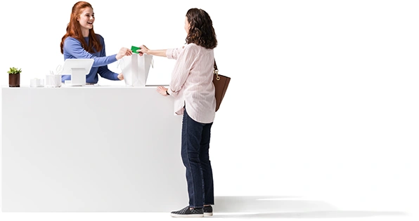 A woman accepts a credit card for a purchase.