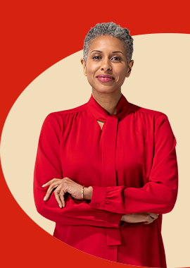 A State Farm agent in red blouse and scarf smiles.