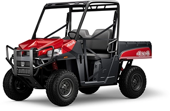 Side view of a red ATV.